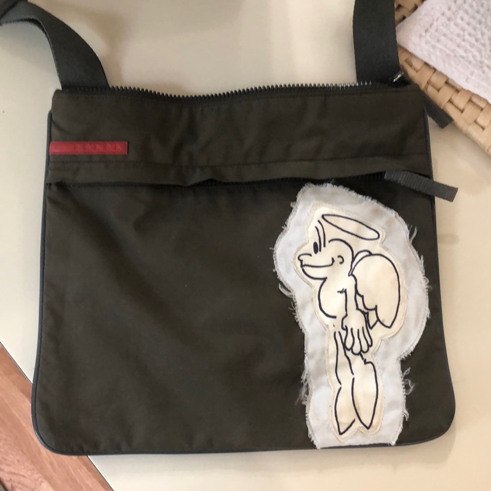 Used Prada bag. Angel Prada adjustable strap and zipper pockets